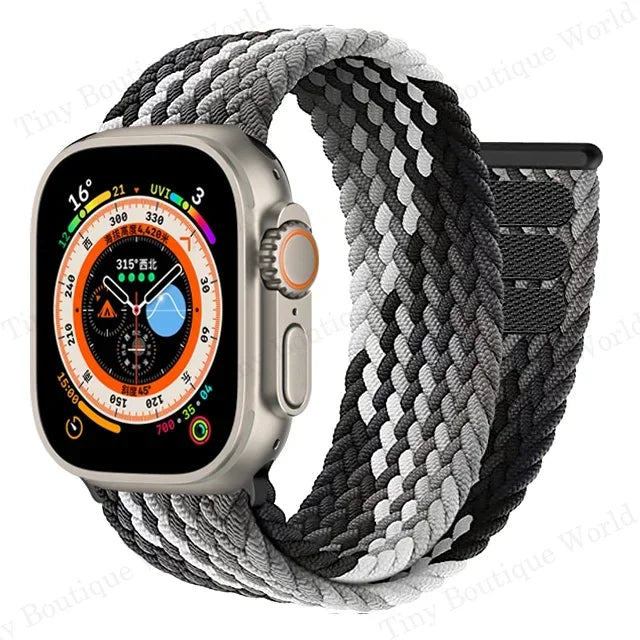 Braided band with Apple Watch face shown in detail with woven pattern
